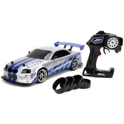 Masina Jada Toys Fast and Furious Nissan Skyline GTR Drift cu anvelope si telecomanda Masina Jada Toys Fast and Furious Nissan Skyline GTR Drift cu anvelope si telecomanda