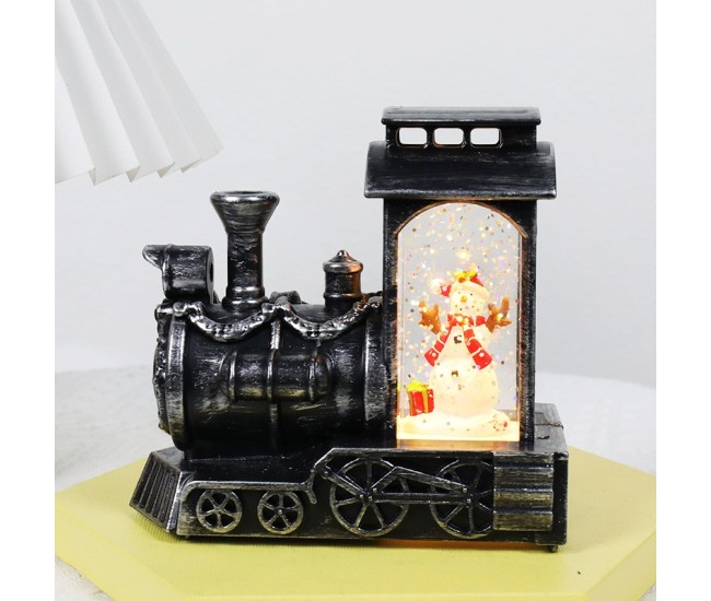 Decoratiune de Craciun tip Locomotiva, Flippy, Glob de Cristal cu Fulgi de Zapada, Model Om de Zapada, Iluminare LED, 11.5 x 12.5 x 6 cm, Carcasa Vintage Bronze, Transparent Decoratiune de Craciun tip Locomotiva, Flippy, Glob de Cristal cu Fulgi de Zapada, Model Om de Zapada, Iluminare LED, 11.5 x 12.5 x 6 cm, Carcasa Vintage Bronze, Transparent
