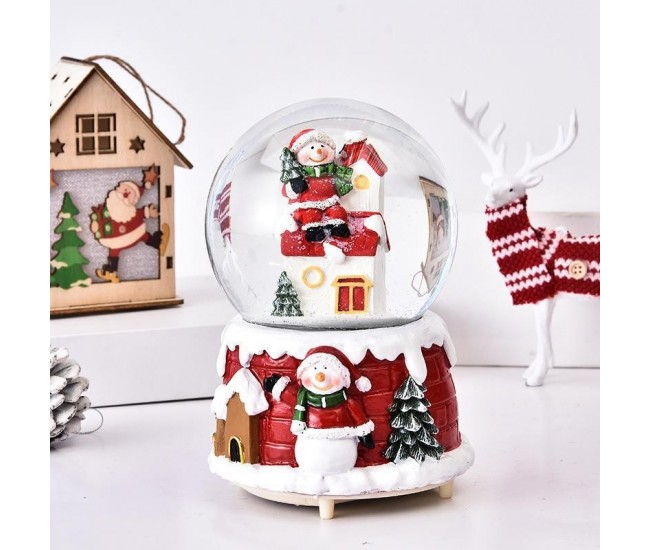 Decoratiune glob cu zapada Flippy, Mos Craciun pe casa, diametru 6.5 cm, multicolor