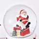 Decoratiune glob cu zapada Flippy, Mos Craciun pe casa, model 2, diametru 6.5 cm, multicolor Decoratiune glob cu zapada Flippy, Mos Craciun pe casa, model 2, diametru 6.5 cm, multicolor