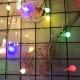 Instalatie sfere brad Craciun Flippy, 4 metri, 30 LEd-uri, alimentare la retea, fir transparent, multicolora