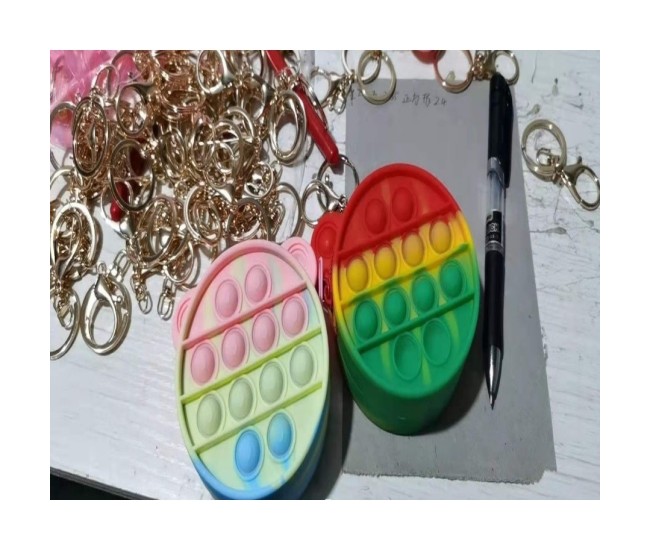 Jucarie Antistres din silicon Flippy, Pop It Now And Flip It, Portofel, 6 cm, Multicolor