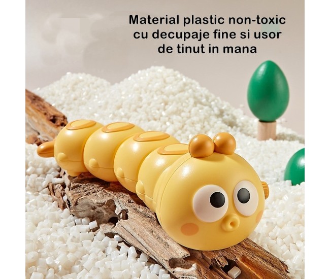 Jucarie mecanica pentru copii Flippy, omida haioasa, material ABS, cu cheita, distractiva, se taraste, se misca, 15 x 4 cm, galben Jucarie mecanica pentru copii Flippy, omida haioasa, material ABS, cu cheita, distractiva, se taraste, se misca, 15 x 4 cm, galben