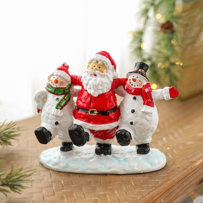 Ornament Decoratiune de Craciun, Flippy, Decoratiune Mica pentru Craciun din Rasina, Model Mos Craciun cu Oameni de Zapada, 16 x 18 x 8 cm, Rosu Alb Ornament Decoratiune de Craciun, Flippy, Decoratiune Mica pentru Craciun din Rasina, Model Mos Craciun cu Oameni de Zapada, 16 x 18 x 8 cm, Rosu Alb