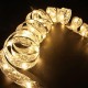Panglică LED de Crăciun Flippy Aurie, lungime 5 m, 50 LED-uri, Baterii, Alb cald Panglică LED de Crăciun Flippy Aurie, lungime 5 m, 50 LED-uri, Baterii, Alb cald
