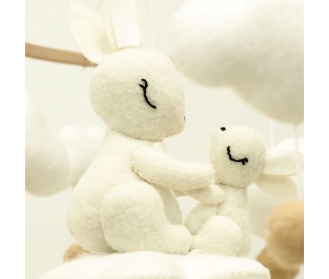 Neno bani – carusel pentru pătuț cu suport de prindere