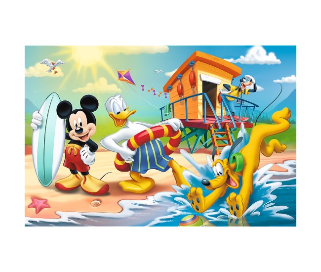 Puzzle trefl 60 distractie pe plaja cu mickey mouse Puzzle trefl 60 distractie pe plaja cu mickey mouse