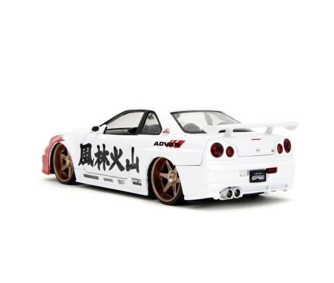 Jada set figurina metalica 6cm si masinuta nissan skyline gtr scara 1 la 24 Jada set figurina metalica 6cm si masinuta nissan skyline gtr scara 1 la 24